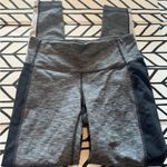 Athleta  Colorblock Revelation Tight in size small Photo 1