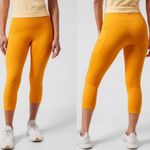 Athleta  Ultimate‎ Stash II Capri Leggings Yellow Size Medium Photo 1