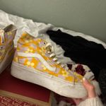 Yellow and white  platform with a floral design💛✌🏼  Callouts: needs a good clean - bleach laces !! Other than that their in great condition   #vans #platforms #vintage #hippie vibes Photo 5