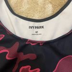 Ivy Park  pink and black camouflage sports bra women’s size medium Photo 2