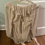 Saints + Secrets Romper Photo 1