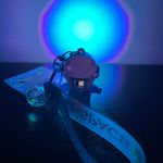 Cute cartoon Astronaut with the sunset light keychain Purple Photo 1