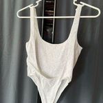 Garage  bodysuit Photo 1