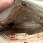 Stone Mountain Versatile White and Black Crossbody Bag with Adjustable Strap Photo 5