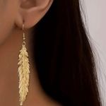 Gorgeous 14K Gold Plated Feather Shaped Dangle Earrings Photo 1