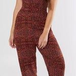 Angie  Animal Print Jumpsuit NWT Photo 0