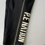 PE Nation • Black Olive Green Stitching Leggings Photo 1