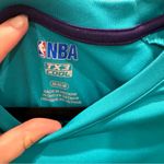 Nba Charlotte Hornets  women’s athletic short sleeve size medium Photo 1