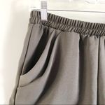 Julie Billiart | Olive Green Tulip Pocket Shorts Photo 1