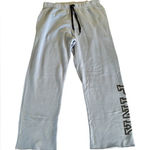 PINK - Victoria's Secret Pink VS Flare Pull On Sweatpants Sz L Blue Drawstring Raw Hem Pink Spell Out Photo 0