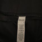 Nike Black Leggings W White Sign On Leg Photo 2