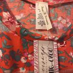 Women’s Coral floral sleeveless blouse Orange Size M Photo 1