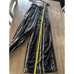 Free People Breezin’ Through Black Striped One Piece Jumpsuit Woman’s size Small Photo 10