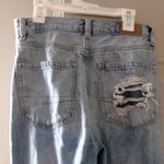 American Eagle  Outfitters mom jean ripped distressed denim in light wash blue size 2. Photo 5