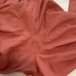 Nike High-Waisted Salmon-Colored Leggings Photo 4