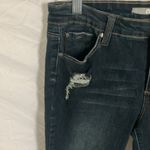 Tractr: Stretchy Skinny Jeans with red flannel covered holes Photo 14