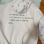 Adika  Sweatshirt Photo 1