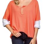 Free People  We the Free Star Relaxed Distressed Henley Top Orange Linen Small Photo 1