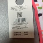 Maaji NWT  Women's Standard Thin Side Bottoms Size Small Pink and White Photo 1