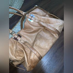 Elliott lucca tan duffel bag logo tassel leather $248 boho western luggage fall Photo 5