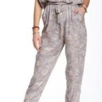 Free People Universal Surplice Jumpsuit In Taupe Photo 0