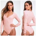 Free People Cozy Up With Me Pink Ribbed Long Sleeve Bodysuit Photo 1
