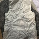 kim rogers White Vest Photo 1