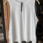 Vuori  energy tank top workout tee sleeveless logo crewneck performance jersey Photo 0