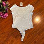 Calvin Klein Light Blue Bodysuit Size Large Photo 1