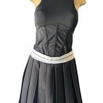 Yinuo Women's Black Pleated Mini Skirt Sporty & Chic Size M Edgy Preppy Photo 1