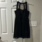 In perfect condition gold and black sequin dress. Size 14 JUNIORS. fits adult S Photo 1