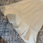 BCBGeneration White Sleeveless Dress with Ruffle Hem Photo 3