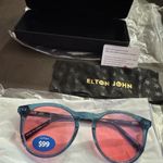 Elton John brand sunglasses with a price tag starting at $139. Blue Photo 0