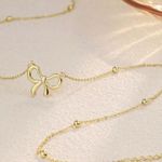 Bow Necklace Gold Photo 0