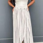 Faithfull the Brand Faithful the brand boho white wrap skirt 
Fits xs to s Photo 0