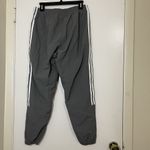 Adidas  gray tapered windbreaker jogger pants size US medium Photo 3
