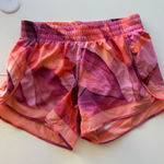 Athleta  Printed Mesh Racer Run Short 4" Pink Orange Abstract Leaf Size S Photo 0