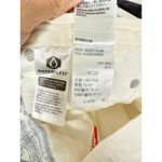 Levi's  High Waisted Slim Fit Denim Cut-Out Jean Short Chalk White Women's W28 Photo 4