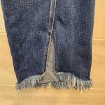 {29} KanCan Distressed Blue Jean Split Flare Hem Fringe Detail Photo 6