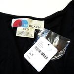 Free People NWT  FP Beach Naomi Jumpsuit in Black Deep V-neck Wide Leg Jersey XS Photo 5