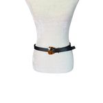 Women's unbranded black leather adjustable belt with animal print buckle Photo 1