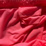 Old Navy Women's Athletic Shorts Neon Coral Running Shorts Size Medium (Pocket) Photo 6