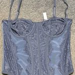 Urban Outfitters out from under blue tank top Photo 0