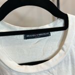 Brandy Melville  Good Vibes Palm Tree Graphic Cropped Muscle Shirt Photo 1