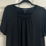 Maggie Barnes  black top 00x/14w Photo 0