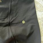 Lululemon Black and Gold Limited Edition 21” Leggings Size 6 Photo 2