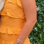 Olivaceous Orange smocked mini dress  Photo 0