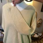 Umgee  cream colored v-neck lace up back long sleeve sweater. Photo 1