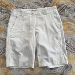 Nike  Women's Dri-FIT Victory 8” Golf Shorts size 4 Photo 0