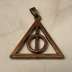 Harry Potter Deathly Hallows Spinning Pendant Bronze Toned Brown Photo 2
